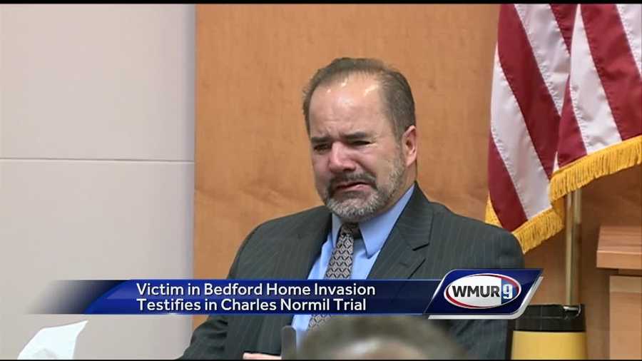 A Bedford doctor who was beaten in a home invasion gave emotional testimony in a trial Wednesday.