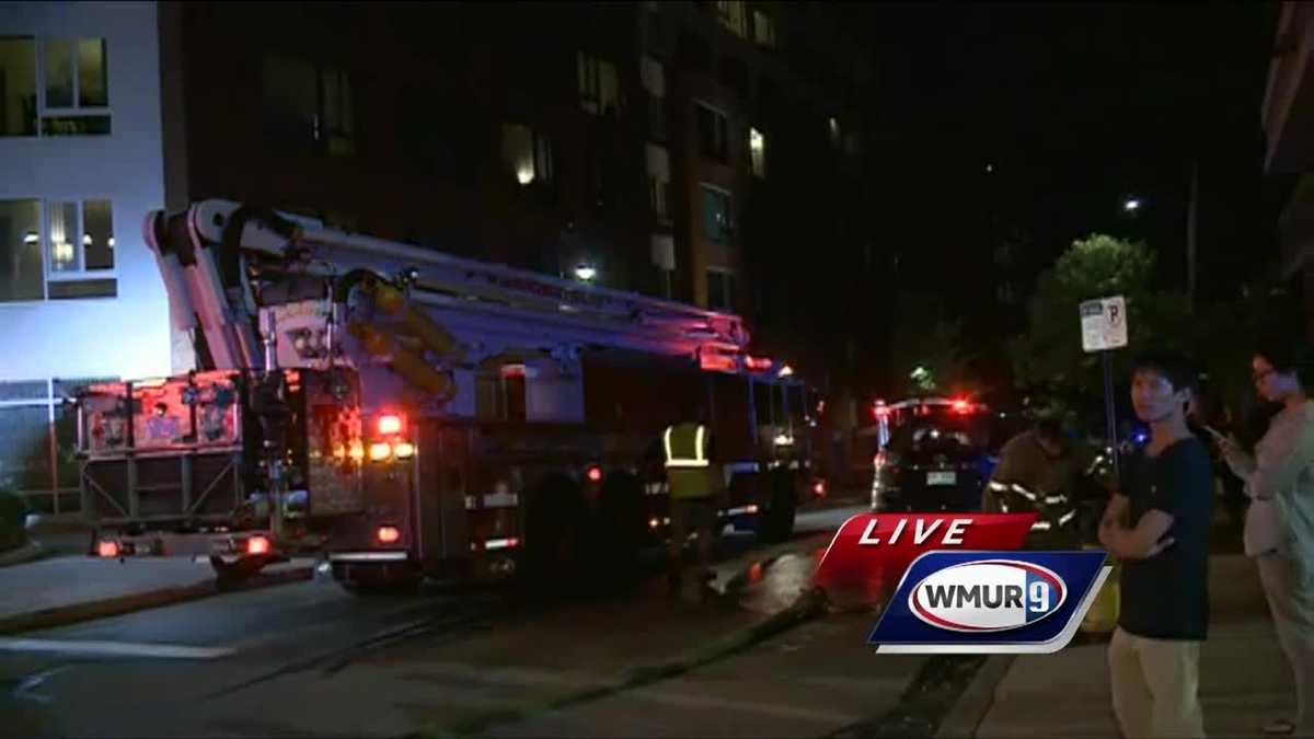 Crews contain fire at high-rise apartment building in Manchester