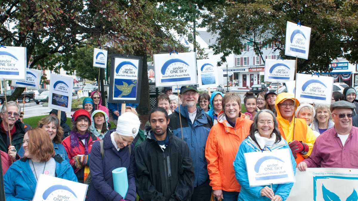 Dozens participate in interfaith peace walk