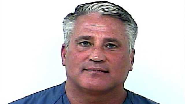 County commissioner Chris Dzadovsky is accused of stealing a pool heater from a home last month.