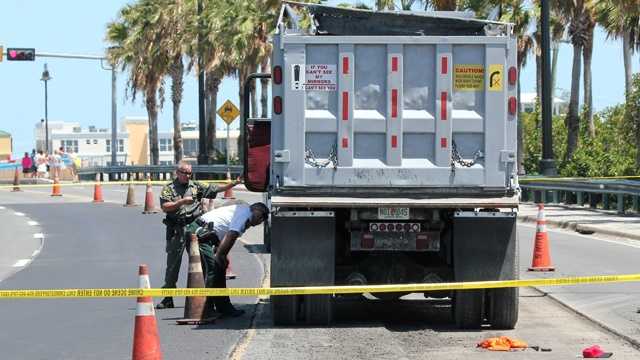 A worker was killed after this dump truck backed over him in Deerfield Beach. (Mike Jachles/Broward Sheriff's Office)