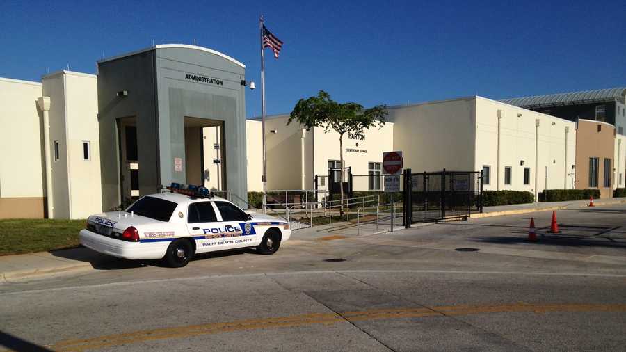Police say two loaded guns were found in a student's backpack at Barton Elementary School.