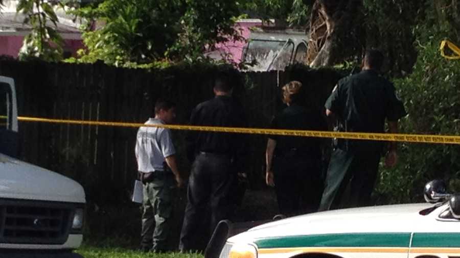 Sheriff's deputies investigate after a body is found in a canal in West Palm Beach.