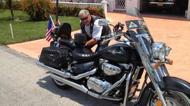 Richard Little, a member of the Patriot Guard, prepares for a ride to a funeral after discussing the Supreme Court's decision to strike down the Stolen Valor Act.