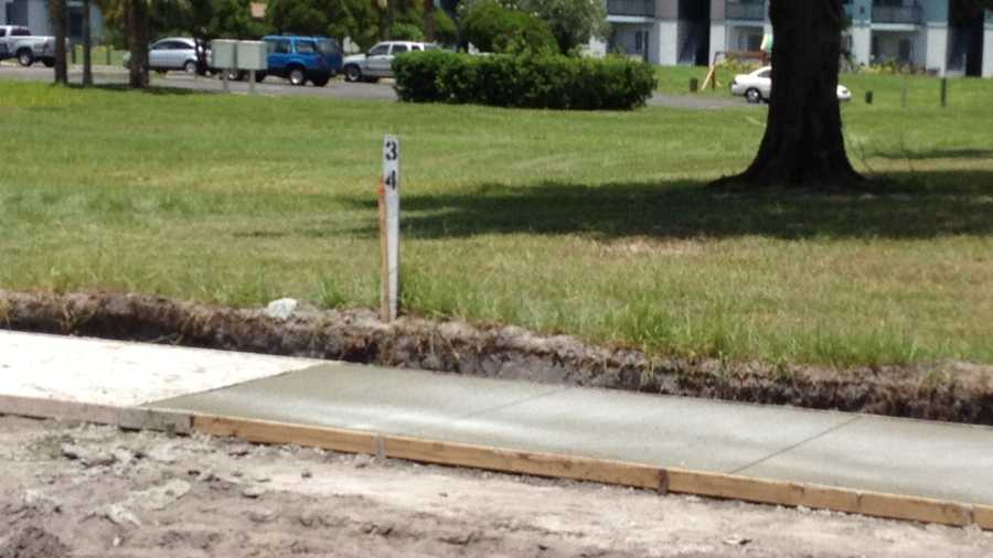 Sidewalks are being installed in a Fort Pierce neighborhood where Christopher Lupin was killed in 2005.