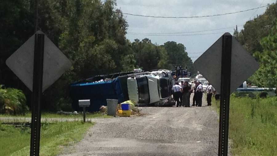 A garbage truck driver was killed in this rollover crash Friday afternoon.