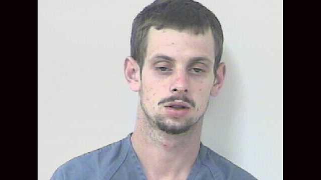Police say Scott Kosakowski was punched in the face during a car burglary.