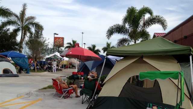 Dozens of Chick-fil-A fans are spending their Wednesday camping out in front of a new store, awaiting its grand opening set for Thursday morning. (Photo: Chris McGrath/WPBF)
