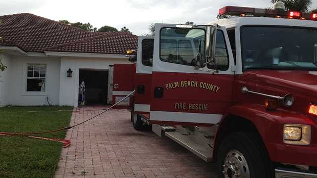 A Palm Beach County firefighter was injured when a section of the ceiling collapsed at this home in the Acreage.