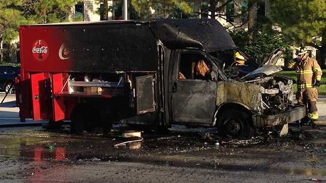 This Coca-Cola truck caught fire on PGA Boulevard, complicating the Tuesday morning drive for many commuters. (Photo: John P. Wise/WPBF)