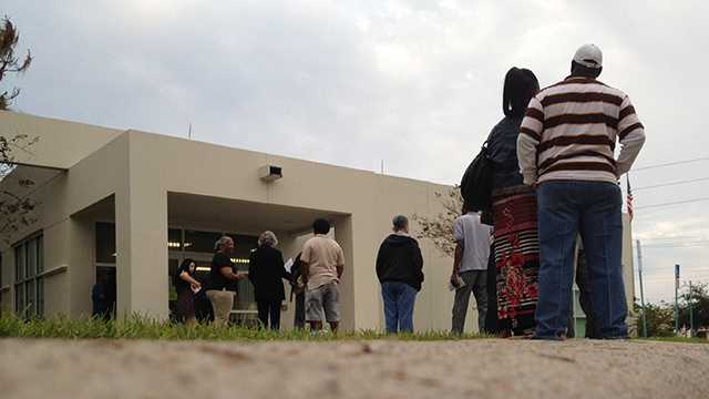 Early voters stand in line Monday morning, hoping to cast their ballots before Election Day. (Photo: Chris McGrath/WPBF)