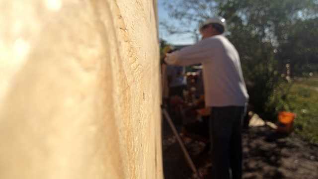 Habitat For Humanity is getting some help from local firefighters to meet a February deadline to build 36 homes. (Photo: Chris McGrath/WPBF)
