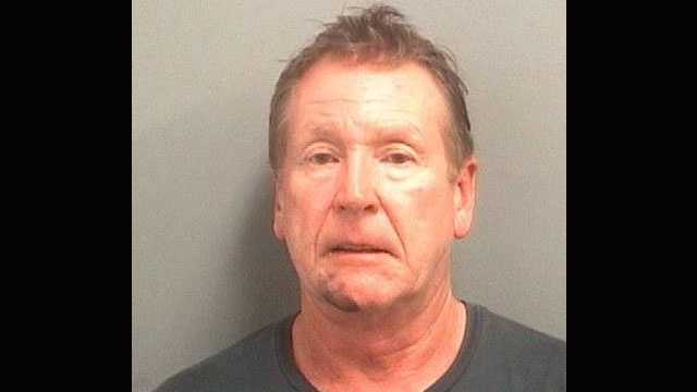 Former South Palm Beach Mayor Martin Millar is accused of punching a woman in the face and pulling her hair.