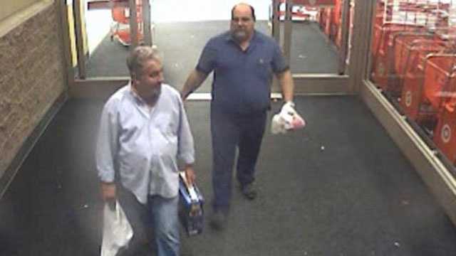 Detectives say these men made thousands of dollars' worth of fraudulent charges on another man's American Express card.