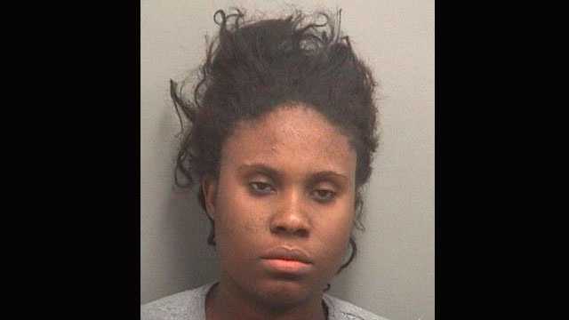 Flore St. Gerard is accused of throwing a pot of hot cooking oil on her family.