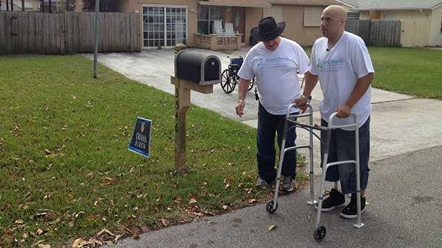 Less than three months after losing his leg while helping accident victims, Angel Soto takes his first steps with a prosthetic leg at his home in Boynton Beach. (Photo: Angela Rozier/WPBF)