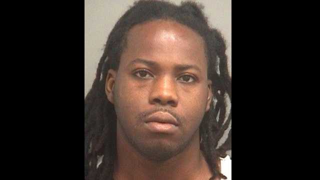 Jean Remy is accused of burglarizing the neighbor of a woman he met on an Internet dating site.