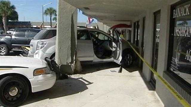 Deputies say a woman sped off in her van with her two children and crashed into this restaurant in Fort Pierce.