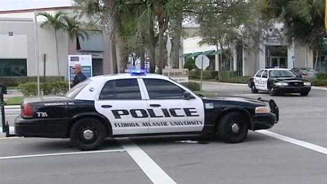 Police say they were forced to shoot a homeless man on the roof of a building at Florida Atlantic University.