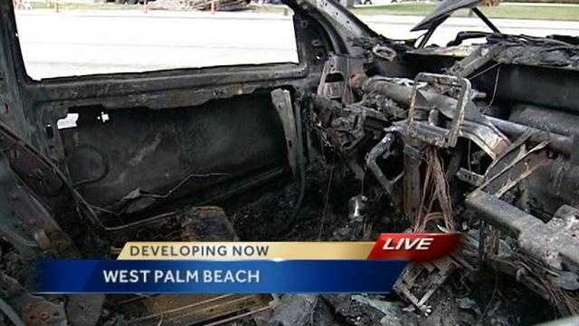 Firefighters said it was miraculous that no one was injured when a car crashed into a pickup truck and caused a fiery explosion.