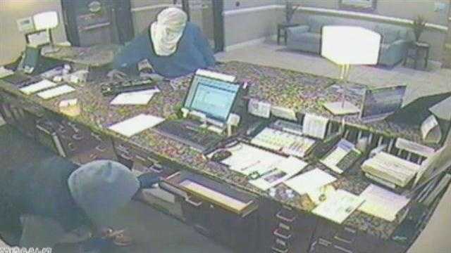 Police are searching for two gunmen who robbed a Holiday Inn Express in Port St. Lucie.