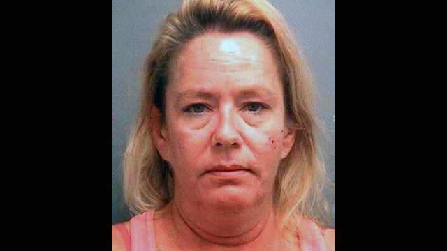 Julie Beers is accused of passing out behind a dumpster with her 5-year-old daughter with her.