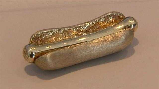 A 14 karat gold hot dog was just some of the celebrity items for sale at a Vero Beach jewelry store.