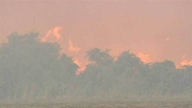 A large brush fire in Fort Pierce forces more than 2500 people to evacuate.