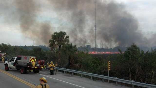 Brush fire rekindles in St. Lucie County