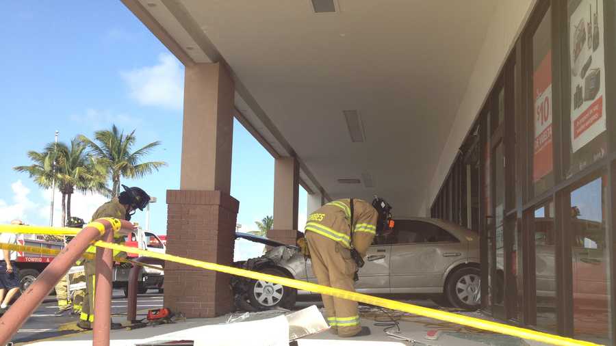 An elderly woman accidentally put her car in reverse and backed into this building in West Palm Beach.