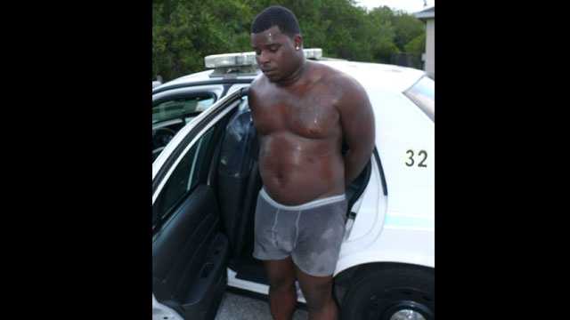 Police Suspect found hiding on back porch dressed only in underwear