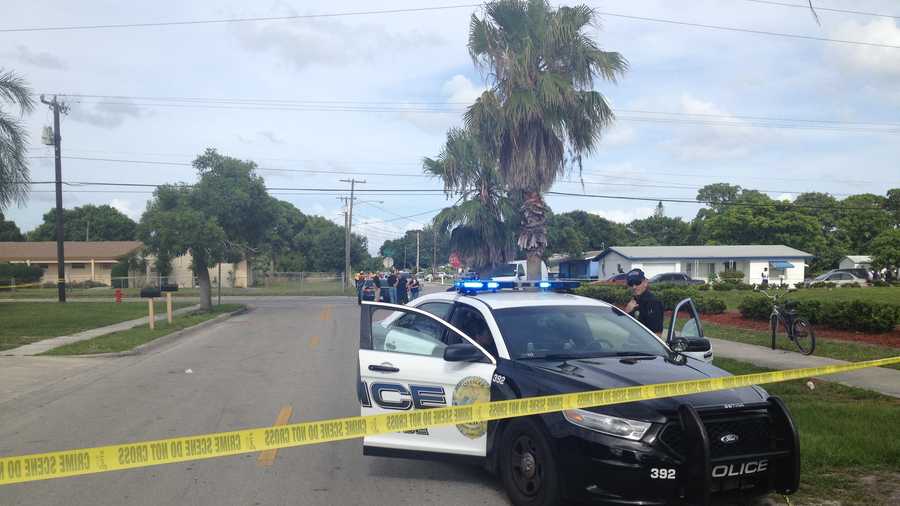 Fort Pierce police are searching for a suspect after two middle-aged men were found dead in a vehicle.