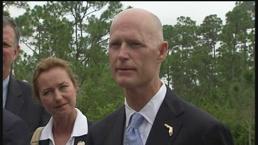 Gov. Rick Scott signs a bill that provides $32 million in state money for Everglades restoration into law.