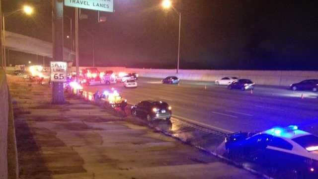 Officials with the Florida Highway Patrol say a car crashed into a patrol car and two other vehicles Sunday night on northbound I-95 near Belvedere Road.