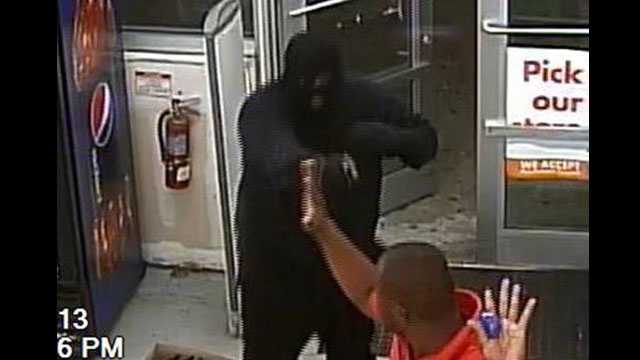 Detectives are trying to identify two masked gunmen who robbed the Family Dollar store in Pahokee.