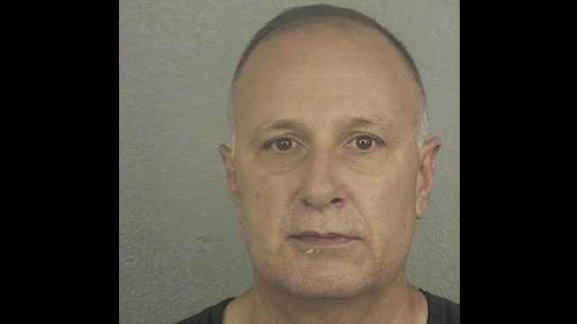 American Airlines pilot Christopher Holmes was arrested on child pornography charges.