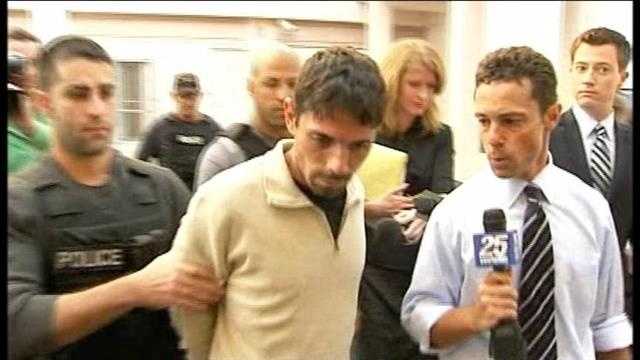 Eduardo Antonanzas is led away in handcuffs after his arrest in 2011.