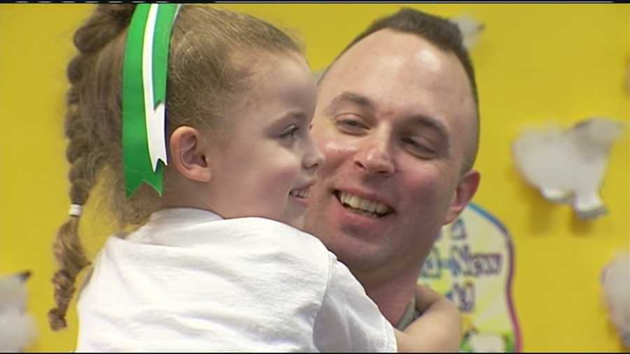 Sgt. Ryan Lowry surprised his daughter Kirstyn in preschool on Wednesday after returning from a six-month deployment overseas.
