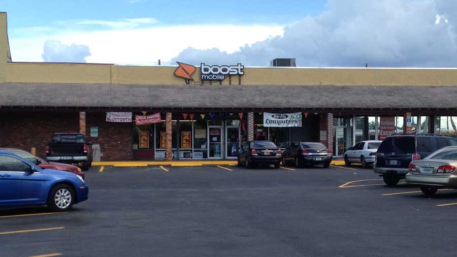 Two people were shot outside this Boost Mobile store in Belle Glade.