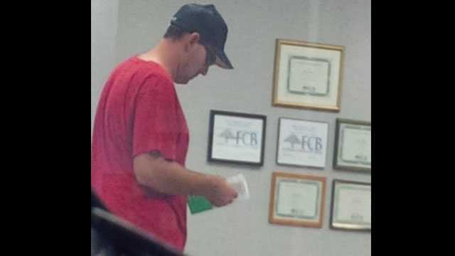 Deputies say this man handed the teller a note that read, "Don't give me the dye pack."