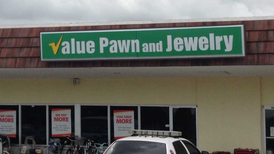 Three men are at large after robbing this pawn shop in Lake Worth on Monday morning.