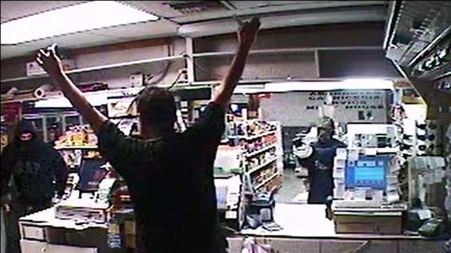 This surveillance image shows the two masked men who robbed La Guadalupana.