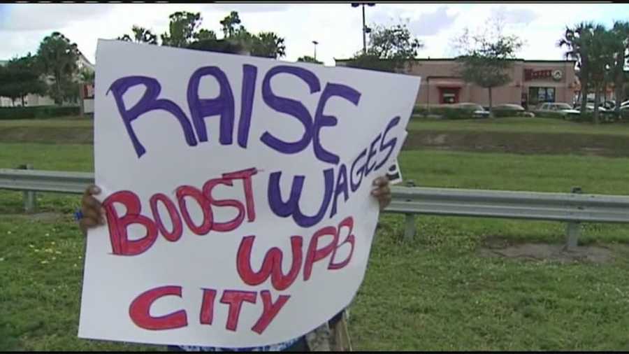 A group of fast-food restaurant workers gather in West Palm Beach to protest poor wages and demand that they be paid $15 an hour.