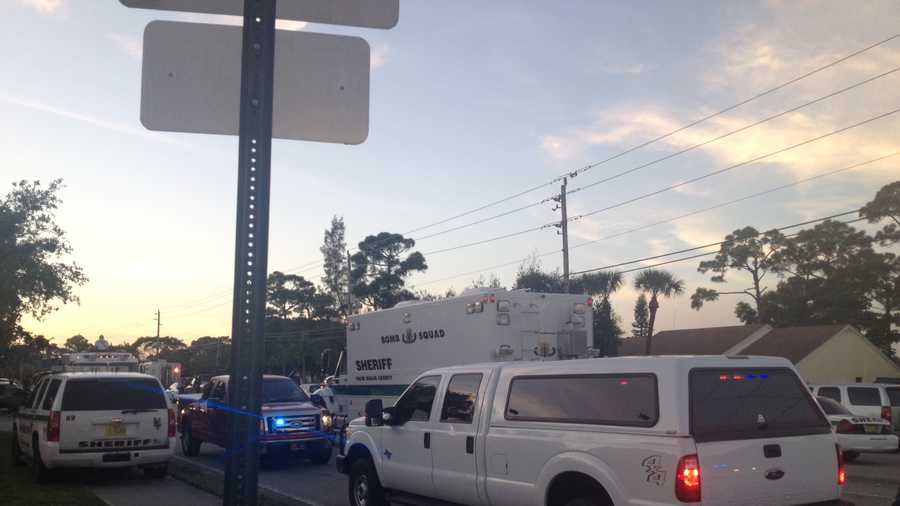 The SWAT team has surrounded a home in Lake Worth.