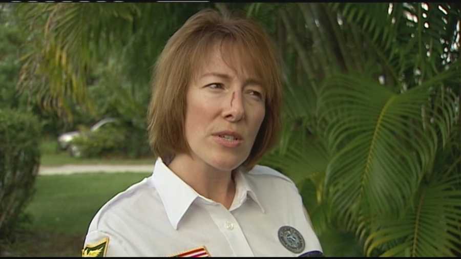 Martin County crossing guard Joan Hoffpaiur was attacked by a pit bull while walking two girls and their mother across the street.
