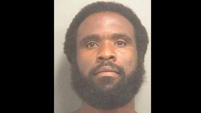 Man accused of watching woman use bathroom arrested