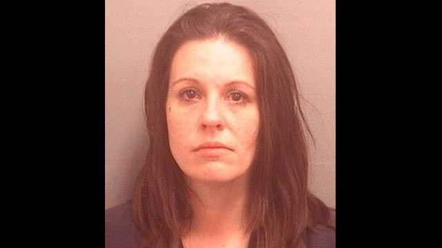 Jennifer Grooms is accused of leaving her two children home alone while she was drinking at Vic & Angelo's in Palm Beach Gardens.