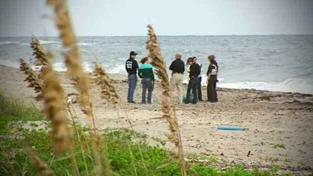 A woman was walking her dogs along the shoreline when she came across Patricia Harrison's body wrapped in a tarp.
