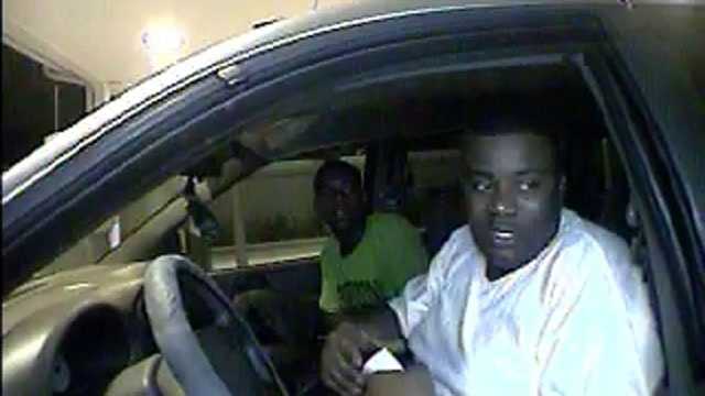 Police are trying to identify these two men who used a robbery victim's stolen credit cards at a PNC Bank drive-through in Boynton Beach.