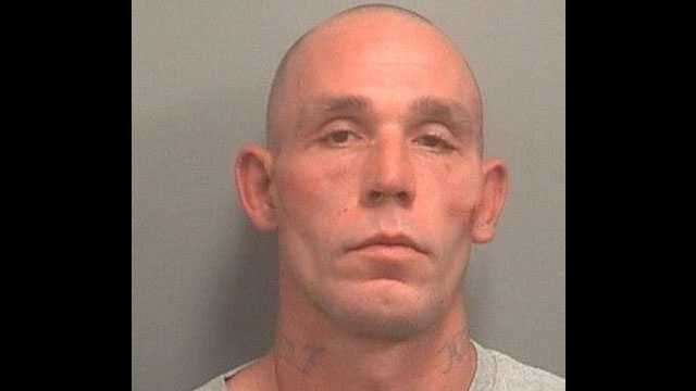 Christopher Gibson is accused of leaving a pit bull outside to die in the heat.